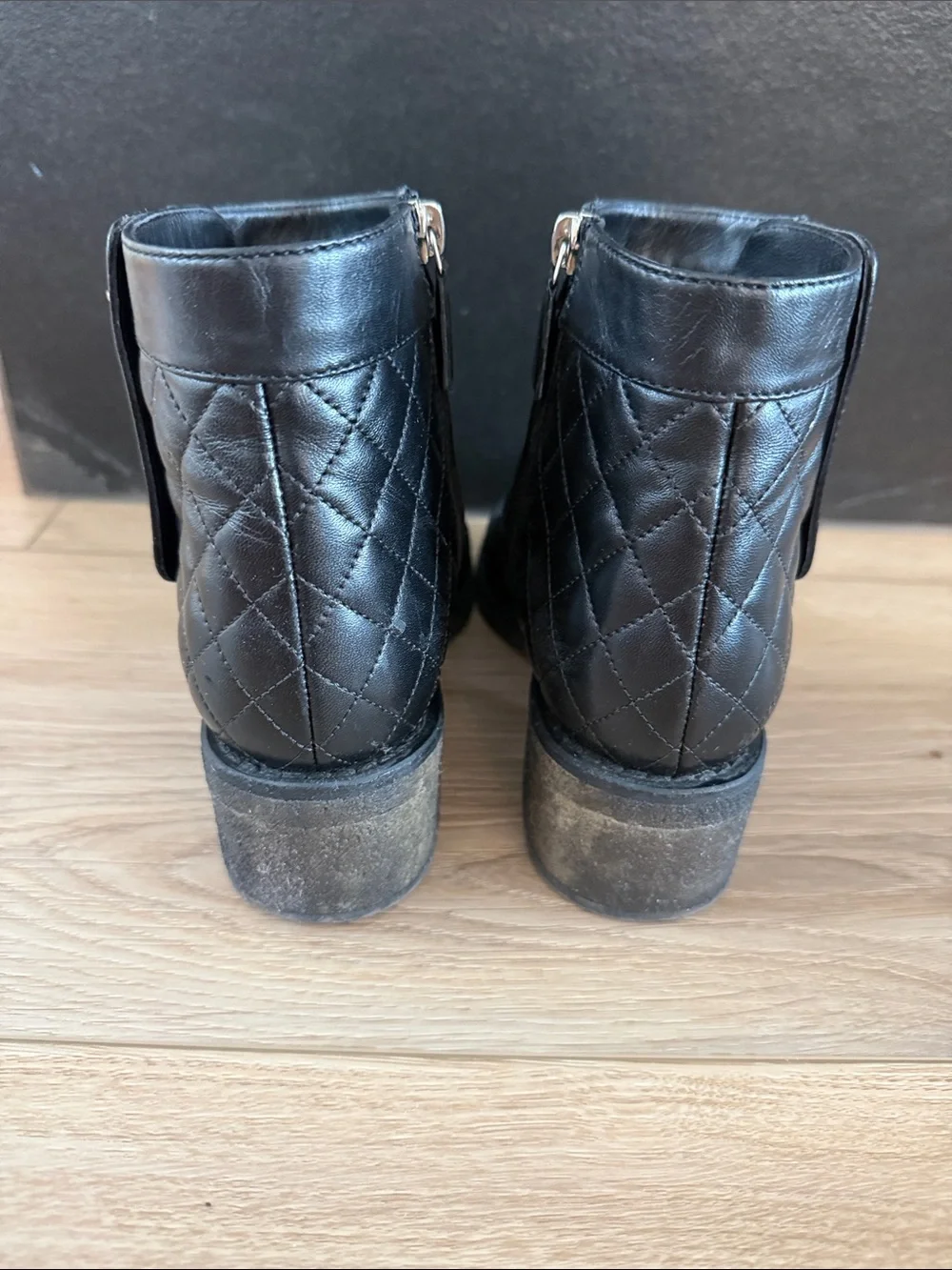 CHANEL Black Quilted Lambskin Ankle Boots with Silver CC Emblems